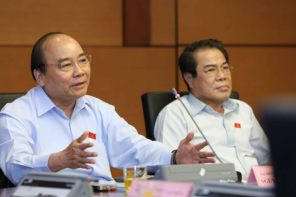 Thủ tướng Nguyễn Xuân Phúc, Đại biểu Quốc hội TP.Hải Phòng phát biểu tại tổ /// Ảnh: TTXVN